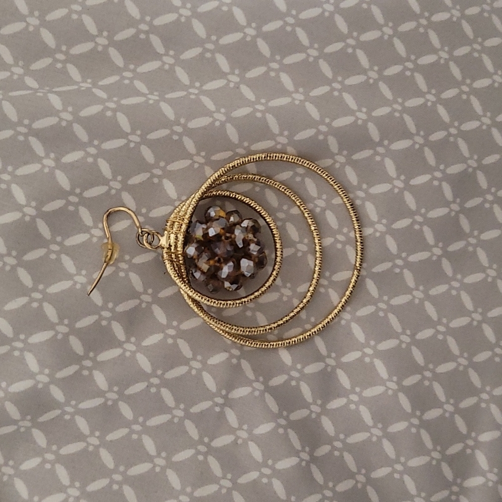 Jennifer Lopez gold earrings